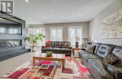 43 Greyhawk Street, Kitchener, ON - Indoor Photo Showing Living Room With Fireplace
