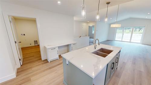 B-353 Legacy Lookout, Cranbrook, BC - Indoor Photo Showing Kitchen With Double Sink