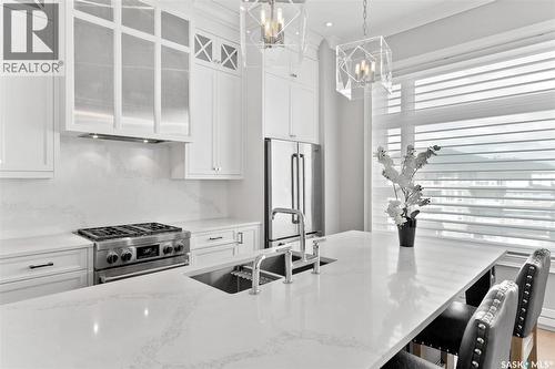 306 404 Cartwright Street, Saskatoon, SK - Indoor Photo Showing Kitchen With Stainless Steel Kitchen With Double Sink With Upgraded Kitchen