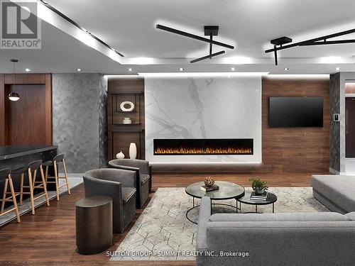1717 - 275 Village Green Square, Toronto, ON - Indoor Photo Showing Other Room With Fireplace