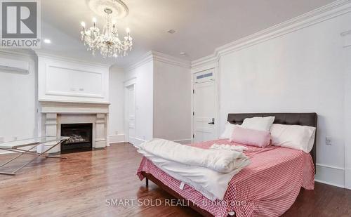 61 Brunswick Avenue, Toronto, ON - Indoor Photo Showing Bedroom With Fireplace