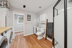 Lower level bathroom and laundry combo - 
