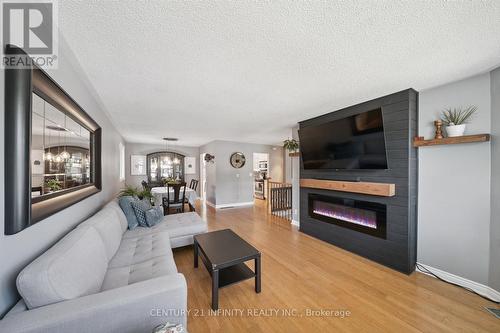 1049 Glenhare Street, Cobourg, ON - Indoor Photo Showing Living Room With Fireplace