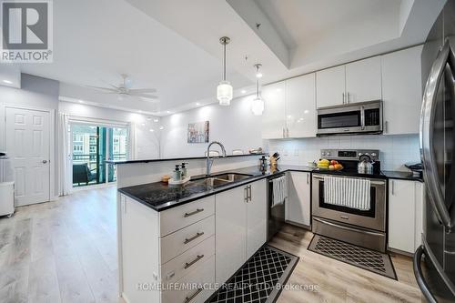 303 - 650 Gordon Street, Whitby, ON - Indoor Photo Showing Kitchen With Stainless Steel Kitchen With Double Sink With Upgraded Kitchen