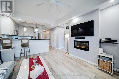 303 - 650 Gordon Street, Whitby, ON - Indoor With Fireplace