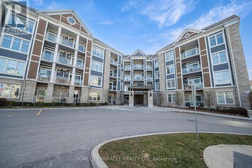 303 - 650 Gordon Street, Whitby, ON - Outdoor With Balcony With Facade