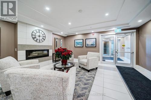 303 - 650 Gordon Street, Whitby, ON - Indoor With Fireplace