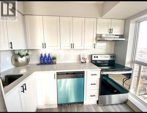 2003 - 215 QUEEN STREET E  Brampton, ON L6Y 1M6