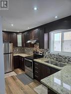 59 REIGATE AVENUE  Brampton, ON L6V 2E2