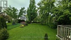 72 Flynn -Back Yard in Summer - 