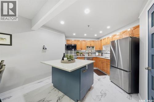 209 301 Cree Crescent, Saskatoon, SK - Indoor Photo Showing Kitchen