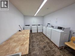 Shared Coin Laundry Room - 