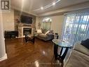 1129 Hickory Hollow Glen, Mississauga, ON  - Indoor Photo Showing Living Room With Fireplace 