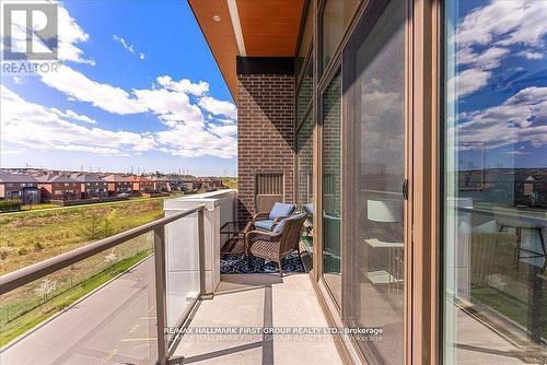 409 - 385 Arctic Red Drive, Oshawa (Windfields), ON - Outdoor With Balcony With Exterior