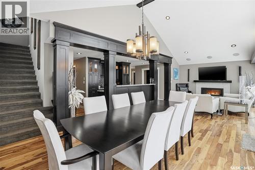 4818 Sandpiper Crescent E, Regina, SK - Indoor Photo Showing Dining Room With Fireplace