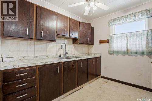 4708 4Th Avenue, Regina, SK - Indoor Photo Showing Kitchen With Double Sink
