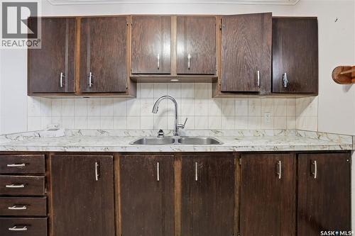 4708 4Th Avenue, Regina, SK - Indoor Photo Showing Kitchen With Double Sink