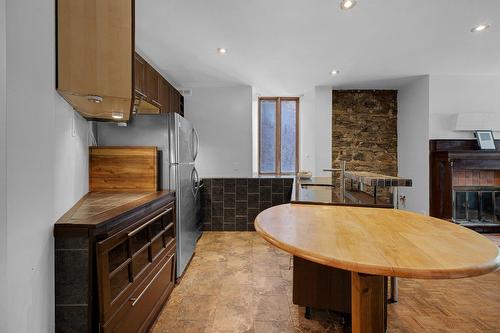 Kitchen - 1-645 Rue Prince-Arthur O., Montréal (Le Plateau-Mont-Royal), QC - Indoor With Fireplace