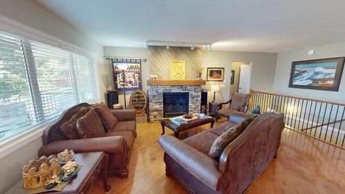 50-1401 30Th Avenue, Cranbrook, BC - Indoor Photo Showing Living Room With Fireplace