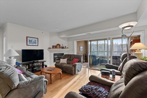 408-1961 Durnin Road, Kelowna, BC - Indoor Photo Showing Living Room With Fireplace