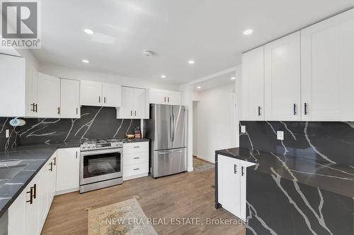 19 Glenabbey Drive, Clarington, ON - Indoor Photo Showing Kitchen With Double Sink