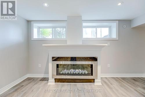 2181 Courtland Drive, Burlington, ON - Indoor Photo Showing Living Room With Fireplace