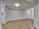 New luxury vinyl flooring. - 62 - 2350 Grand Ravine Drive, Oakville, ON  - Indoor Photo Showing Other Room 