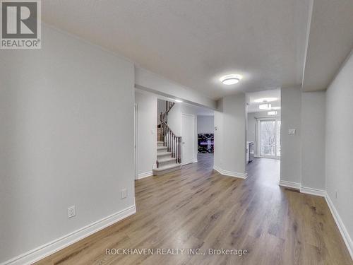 New luxury vinyl flooring. - 62 - 2350 Grand Ravine Drive, Oakville, ON - Indoor Photo Showing Other Room