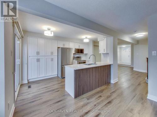 New kitchen with quartz countertop. - 62 - 2350 Grand Ravine Drive, Oakville, ON - Indoor Photo Showing Kitchen