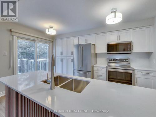 Brand new Kitchenaid appliances - 62 - 2350 Grand Ravine Drive, Oakville, ON - Indoor Photo Showing Kitchen With Double Sink