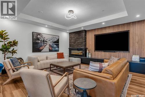 201 3581 Evans Court, Regina, SK - Indoor Photo Showing Living Room With Fireplace