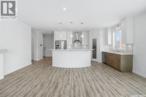 201 3581 Evans Court, Regina, SK - Indoor Photo Showing Kitchen With Upgraded Kitchen