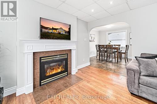 17 Eastwood Avenue N, Oshawa (Samac), ON - Indoor Photo Showing Living Room With Fireplace