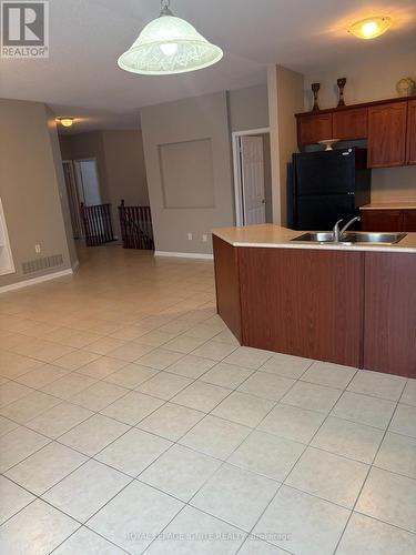 18 Red Pine Crescent, Wasaga Beach, ON - Indoor Photo Showing Kitchen With Double Sink