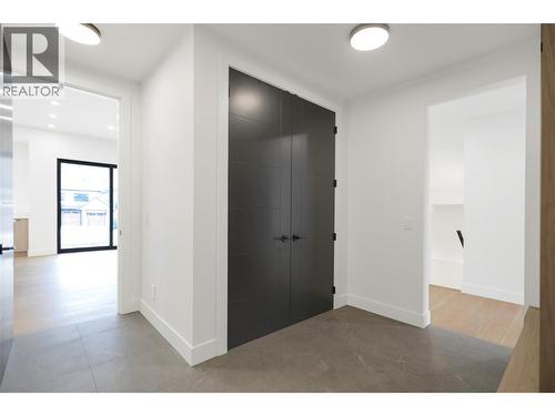 Mudroom with ample storage and a spacious closet - 5533 Foothill Court, Kelowna, BC - Indoor Photo Showing Other Room