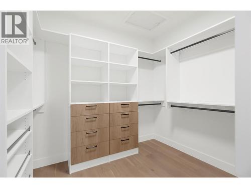 Large master bedroom walk in closet - 5533 Foothill Court, Kelowna, BC - Indoor With Storage