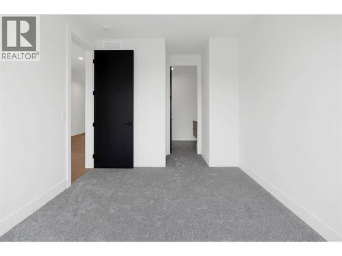 Bedroom 2 on upper with ensuite - 5533 Foothill Court, Kelowna, BC - Indoor Photo Showing Other Room