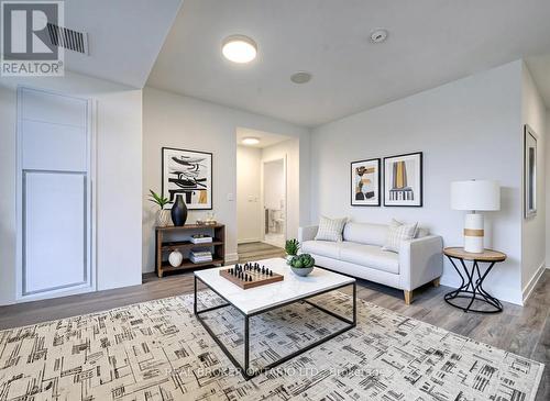 Virtually Staged - 705 - 500 Brock Avenue, Burlington (Brant), ON - Indoor Photo Showing Living Room