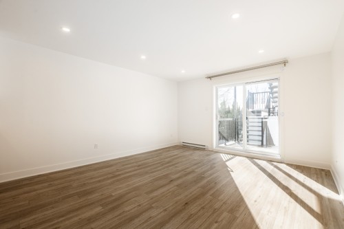 Living Room - 3318 Rue Windsor, Longueuil (Saint-Hubert), QC - Indoor Photo Showing Other Room