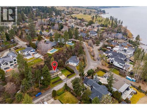 Beach access across the street  - great for swimming or launching a paddle board/kayak - 391 Braeloch Road, Kelowna, BC - Outdoor With Body Of Water With View