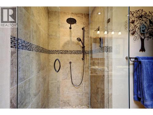 Dual head walk in shower with custom tile and glass - 391 Braeloch Road, Kelowna, BC - Indoor Photo Showing Bathroom