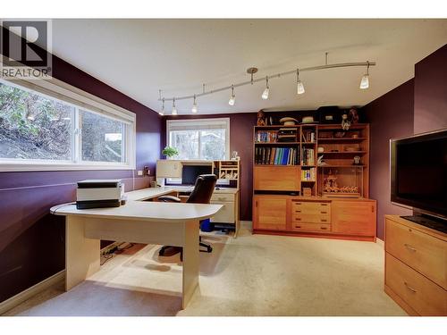 2nd bedroom on lower level, windows facing rear of property - 391 Braeloch Road, Kelowna, BC - Indoor Photo Showing Office