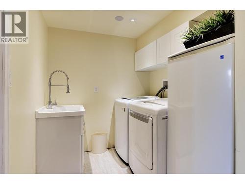 Laundry room with LG Washer and Dryer - 391 Braeloch Road, Kelowna, BC - Indoor Photo Showing Laundry Room