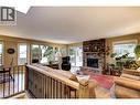 Main Floor - Spacious living room with tons of natural light - 391 Braeloch Road, Kelowna, BC  - Indoor Photo Showing Living Room With Fireplace 