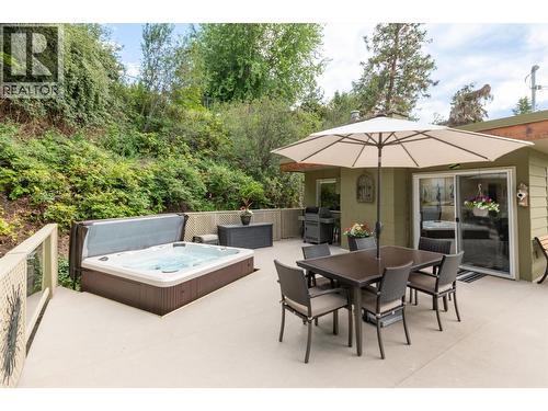 Wet zone 2012 hot tub on large 1100 sqft patio - 391 Braeloch Road, Kelowna, BC - Outdoor