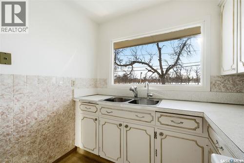 3213 Patricia Avenue, Regina, SK - Indoor Photo Showing Kitchen With Double Sink