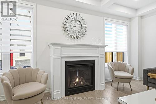 90 Robertson Road, Hamilton, ON - Indoor Photo Showing Living Room With Fireplace