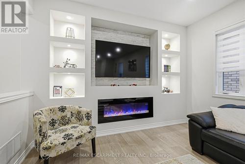 90 Robertson Road, Hamilton, ON - Indoor Photo Showing Living Room With Fireplace