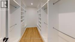 Primary Bedroom - One of Two Closets - 