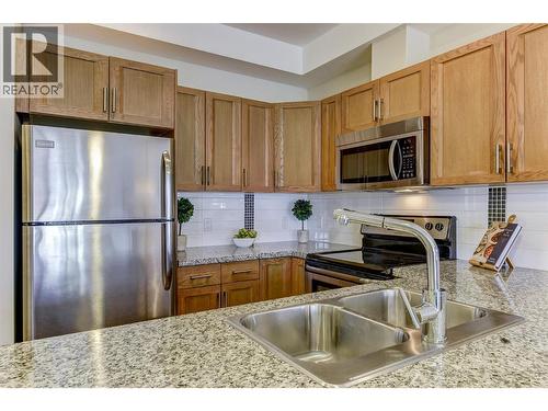 Pictures are from a similar one bedroom staged unit. - 3220 Skyview Lane Unit# 202, West Kelowna, BC - Indoor Photo Showing Kitchen With Stainless Steel Kitchen With Double Sink